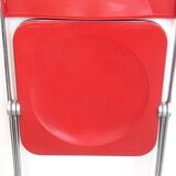 Red Plia chair Giancarlo Piretti Anonima Castelli