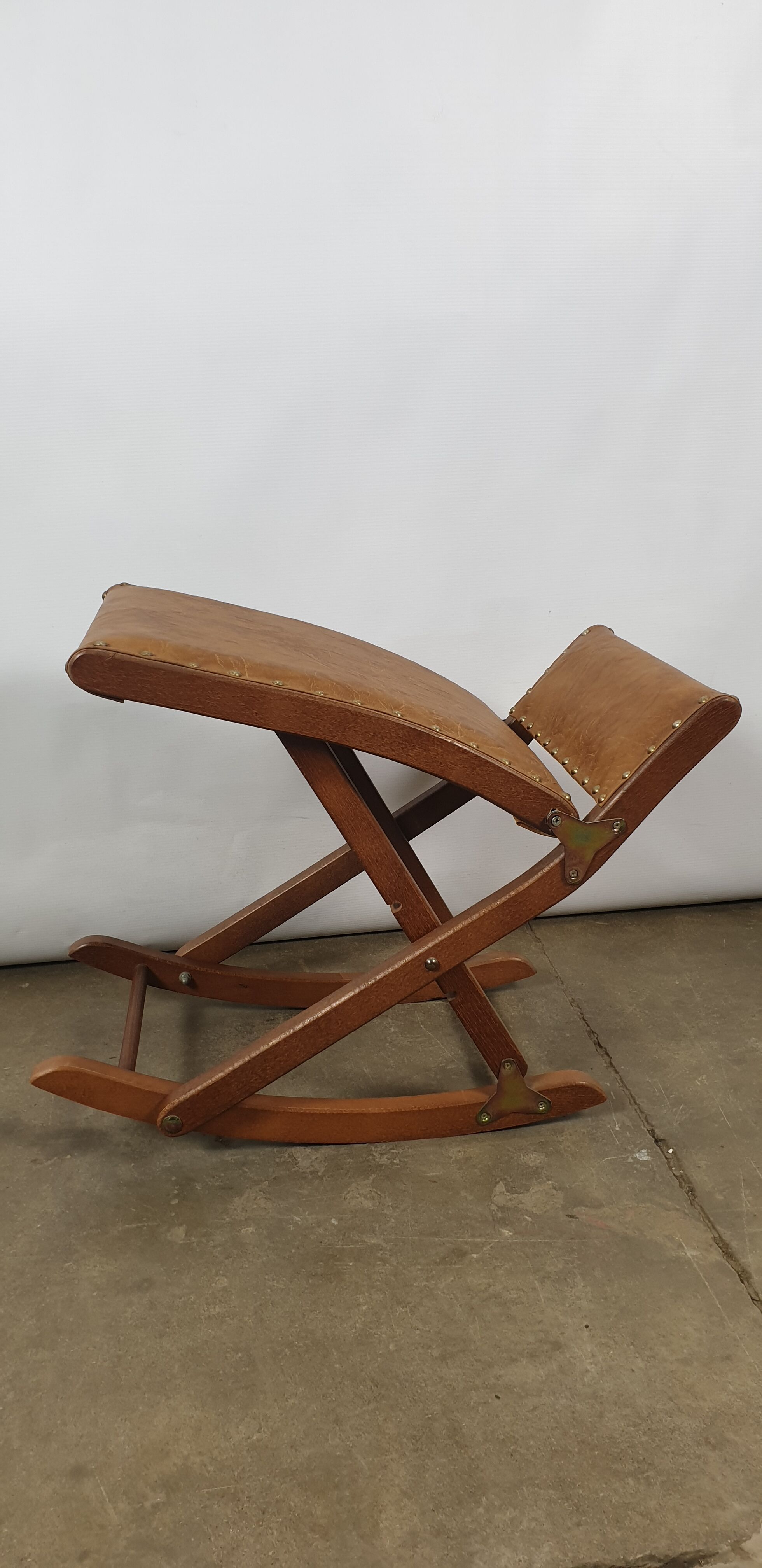 Wooden and leather folding rocking footring