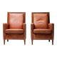 Pair of Art Deco armchairs in brown leather and teak, Netherlands, 1970s.