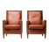 Pair of Art Deco armchairs in brown leather and teak, Netherlands, 1970s.