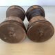 Pair of carved wooden candlesticks