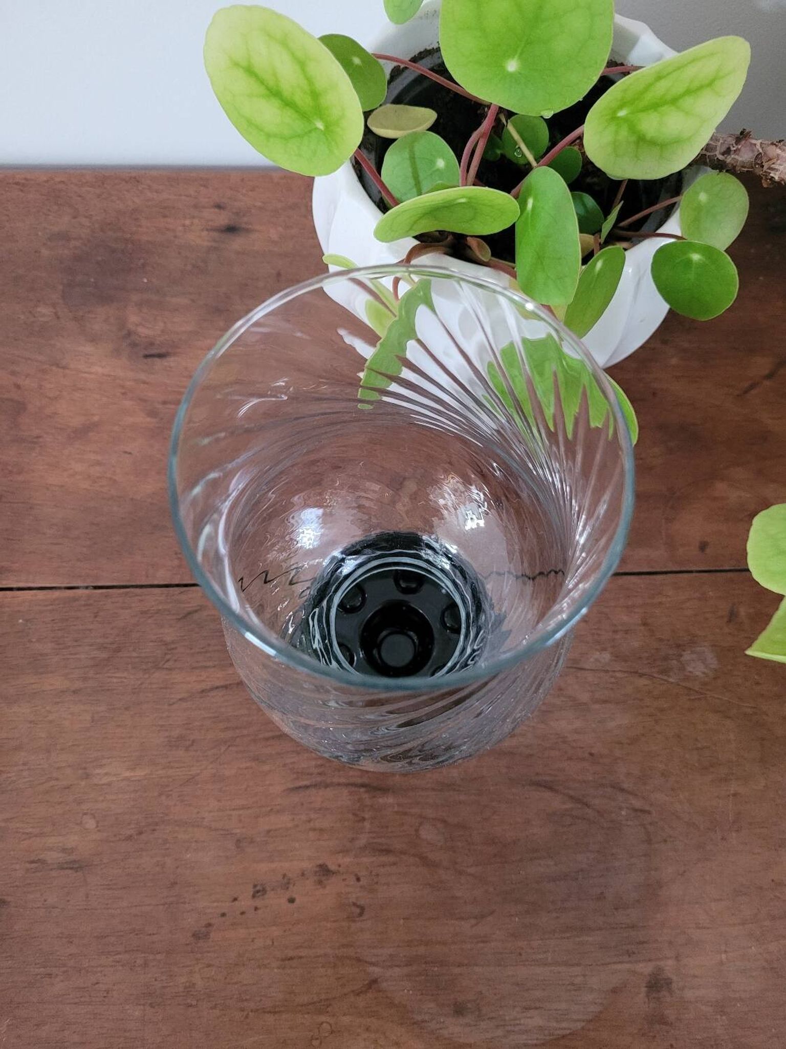 Glass candle holder with black base