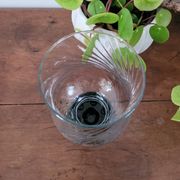 Glass candle holder with black base