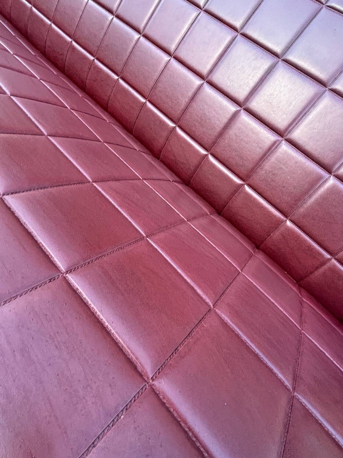 Vintage 70s red and black embossed sofa armchair set