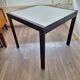 Italian metal table with frosted glass top, extendable.