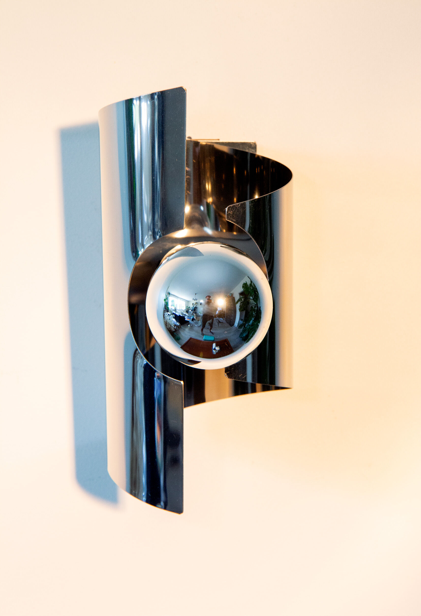 Pair of twisted wall lamps, chromed steel, year 70