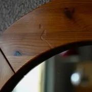 Vintage Scandinavian round wall mirror in solid pine from the 60s-70s.