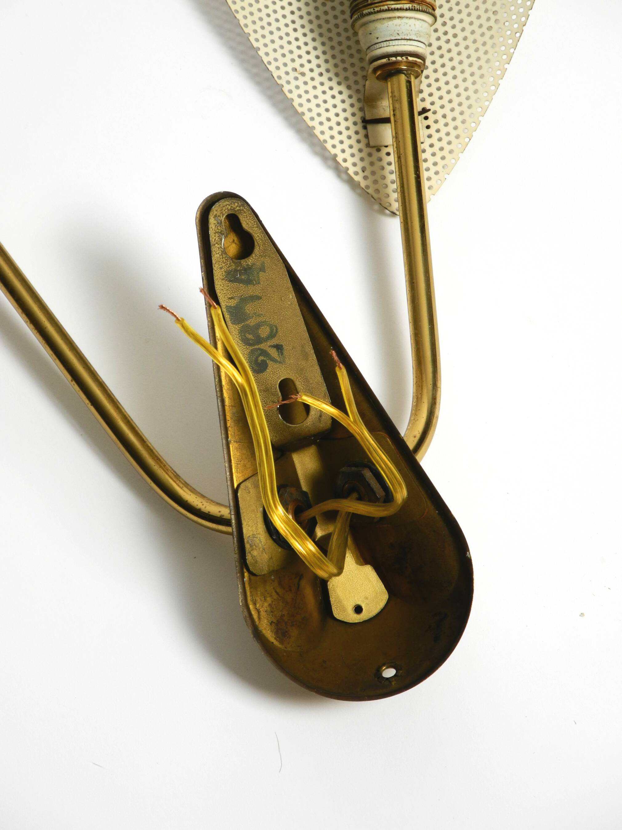 Mid Century Modern brass wall lamp with perforated metal sheet lampshades