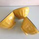 Suite of three yellow ribbed bowls with blue / vintage 70s border