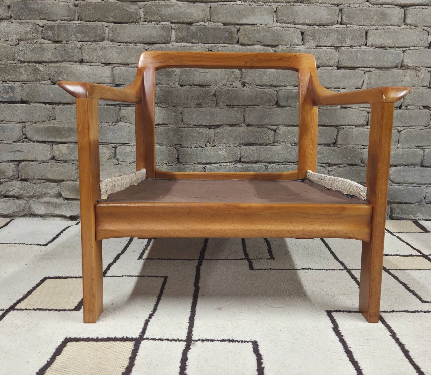 Danish canapé and its 1970s teak armchair