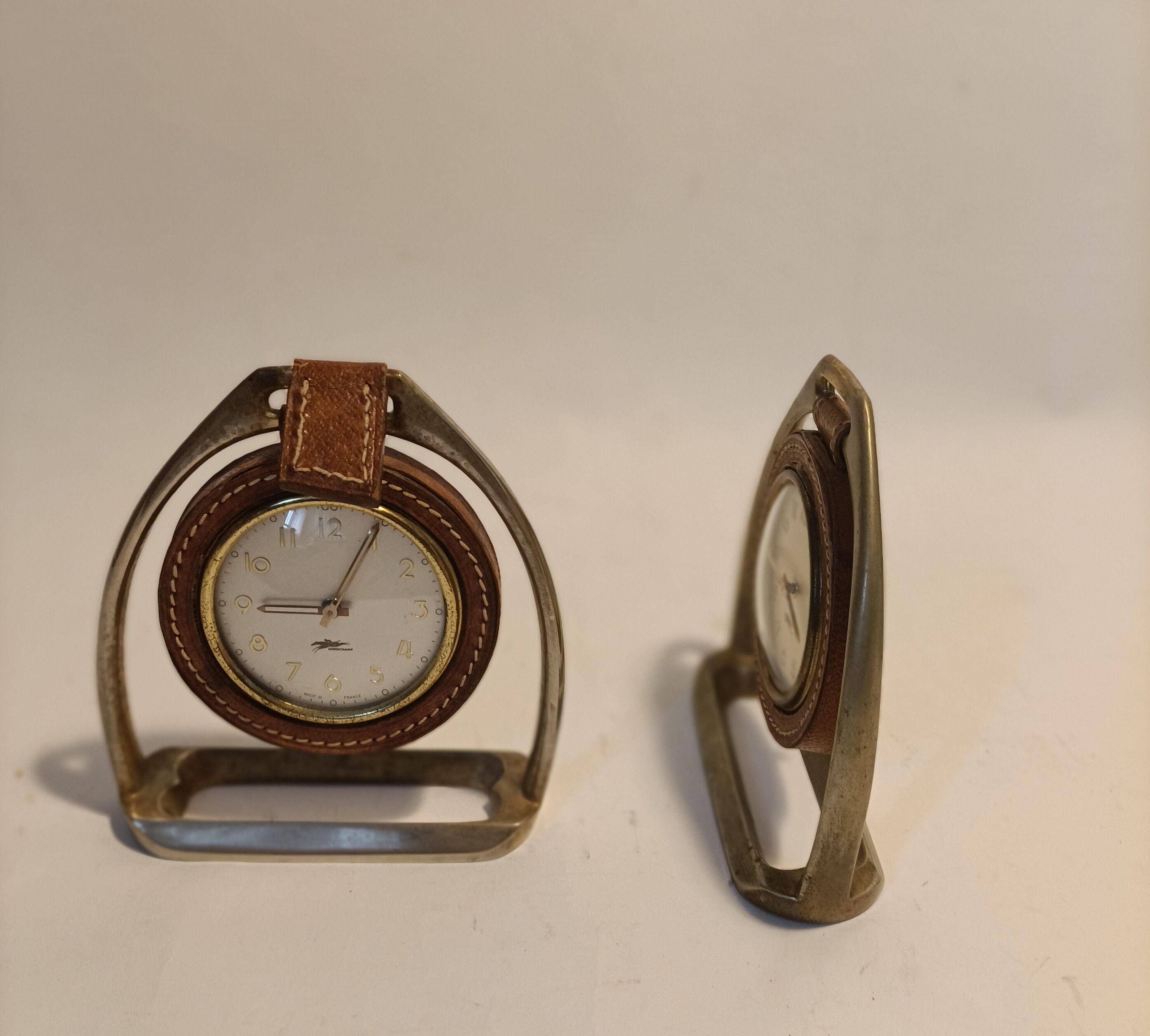 Pair of Longchamps 1960 leather stirrup pendulettes.