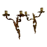 Two Louis XV style bronze wall candlesticks