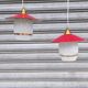 Pair of enamelled sheet metal and glass pendant lights