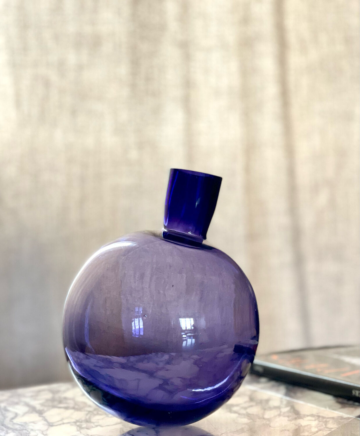 Purple vase inclined