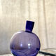 Purple vase inclined