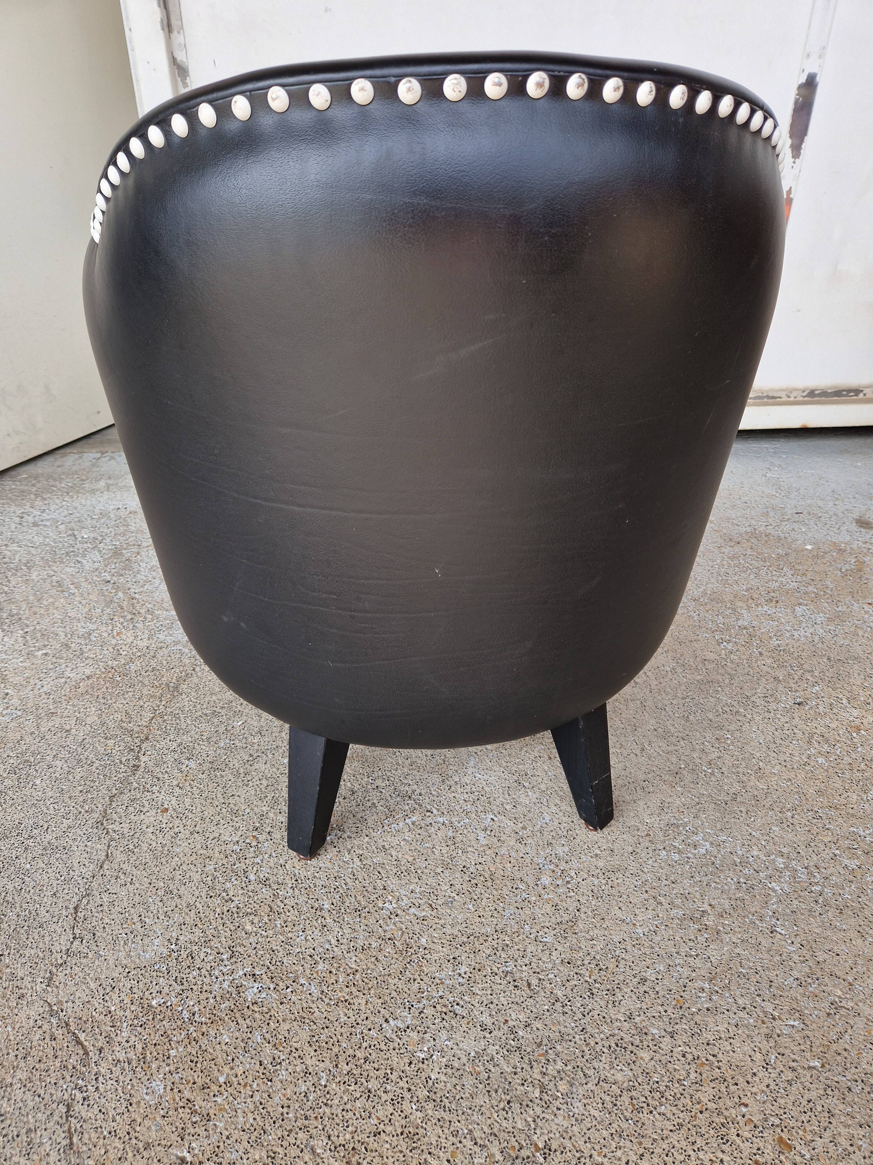 Pair of armchairs in imitation leather