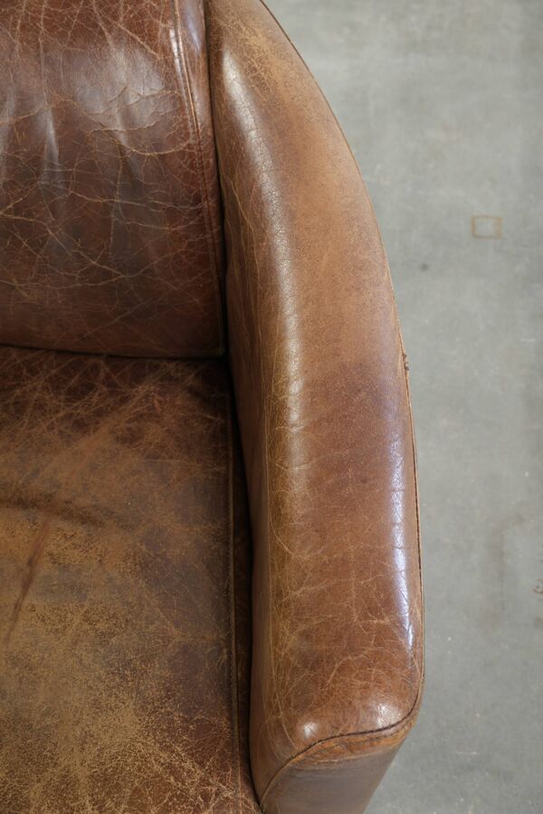 Fauteuil design aviateur en cuir de vache couleur cognac robuste