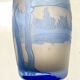 Transparent vase with a blue pattern featuring trees, signed MICHNA.
