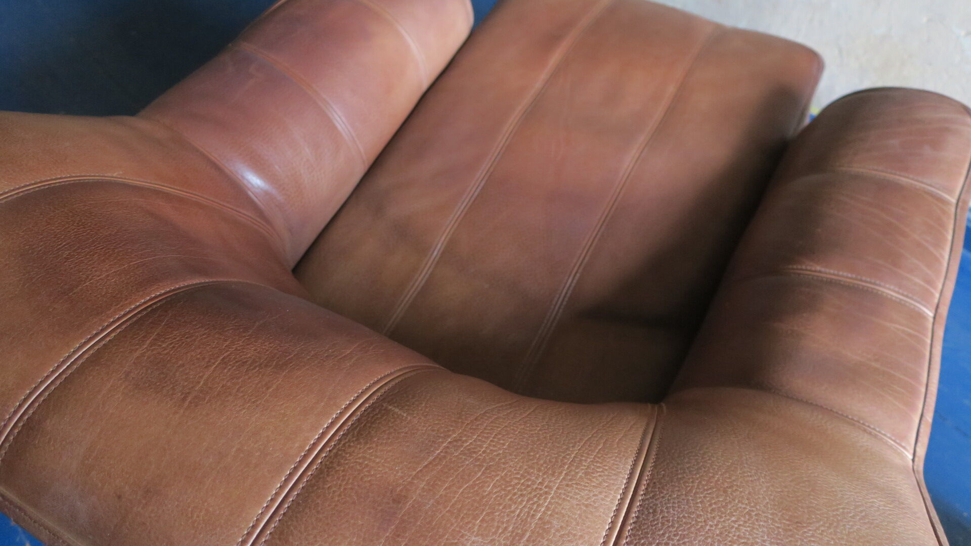 De Sede model DS44 patinated buffalo leather lounge chair and ottoman, 1970s