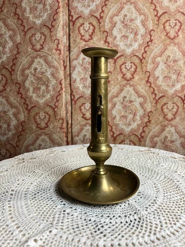 Gold-plated brass candlestick with push button