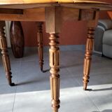Old round table in walnut with flaps Louis Philippe