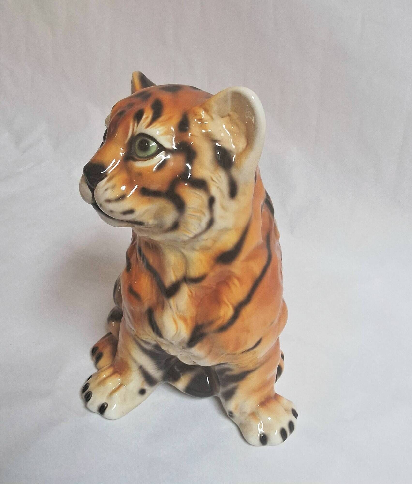 Vintage animal sculpture in Italian ceramic depicting a tiger cub.