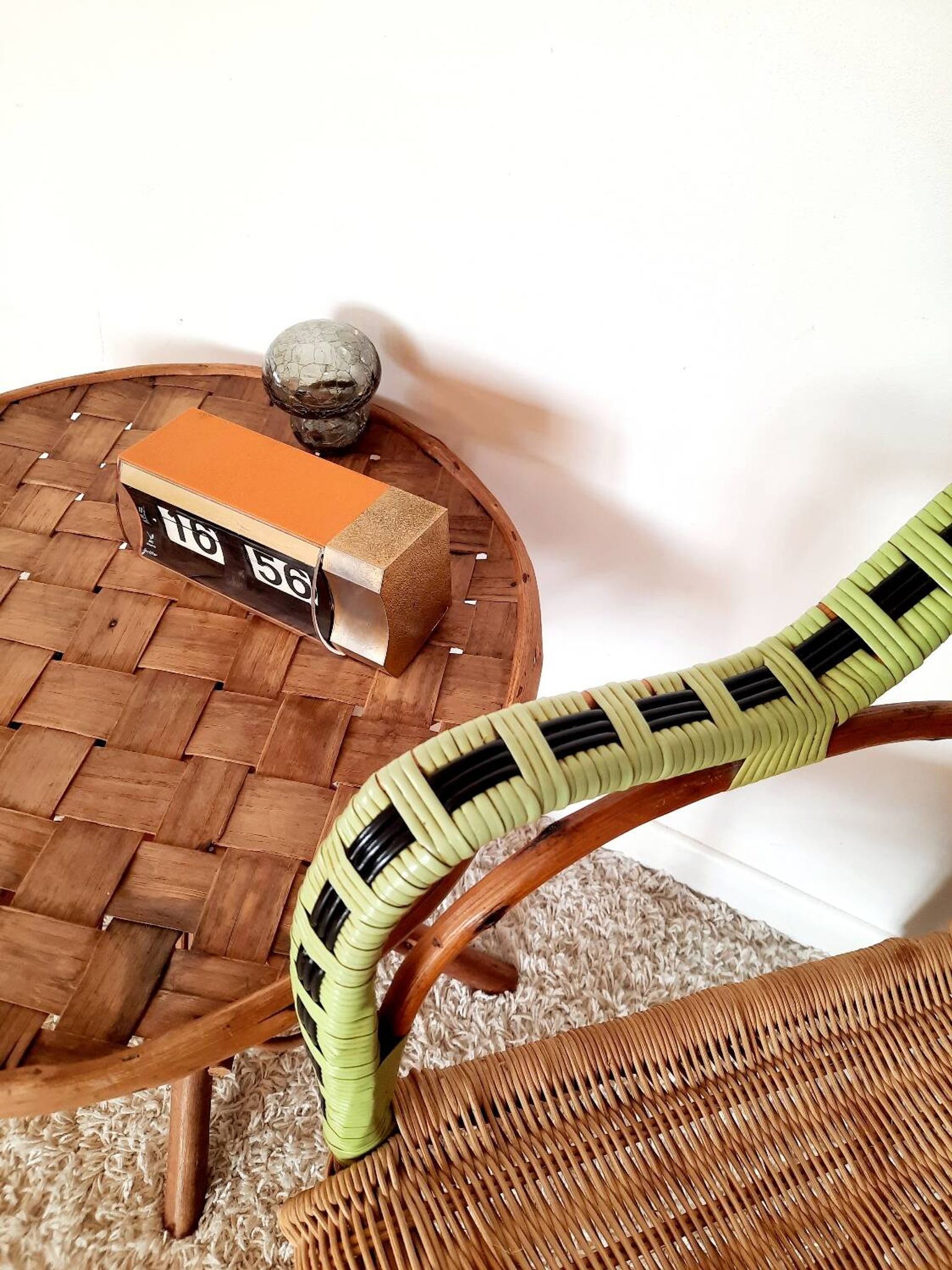 1950s 60s rattan armchair with green apple and black piping.
