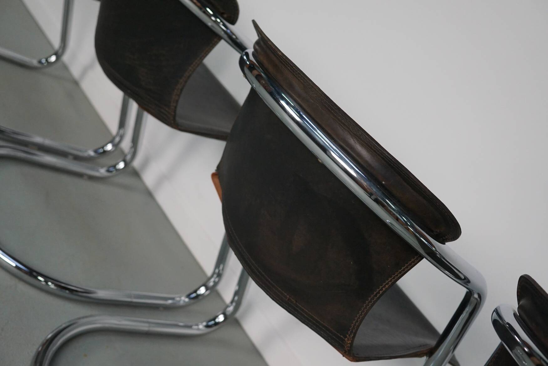 Set of four brown leather dining chairs, Willy Rizzo, 1970