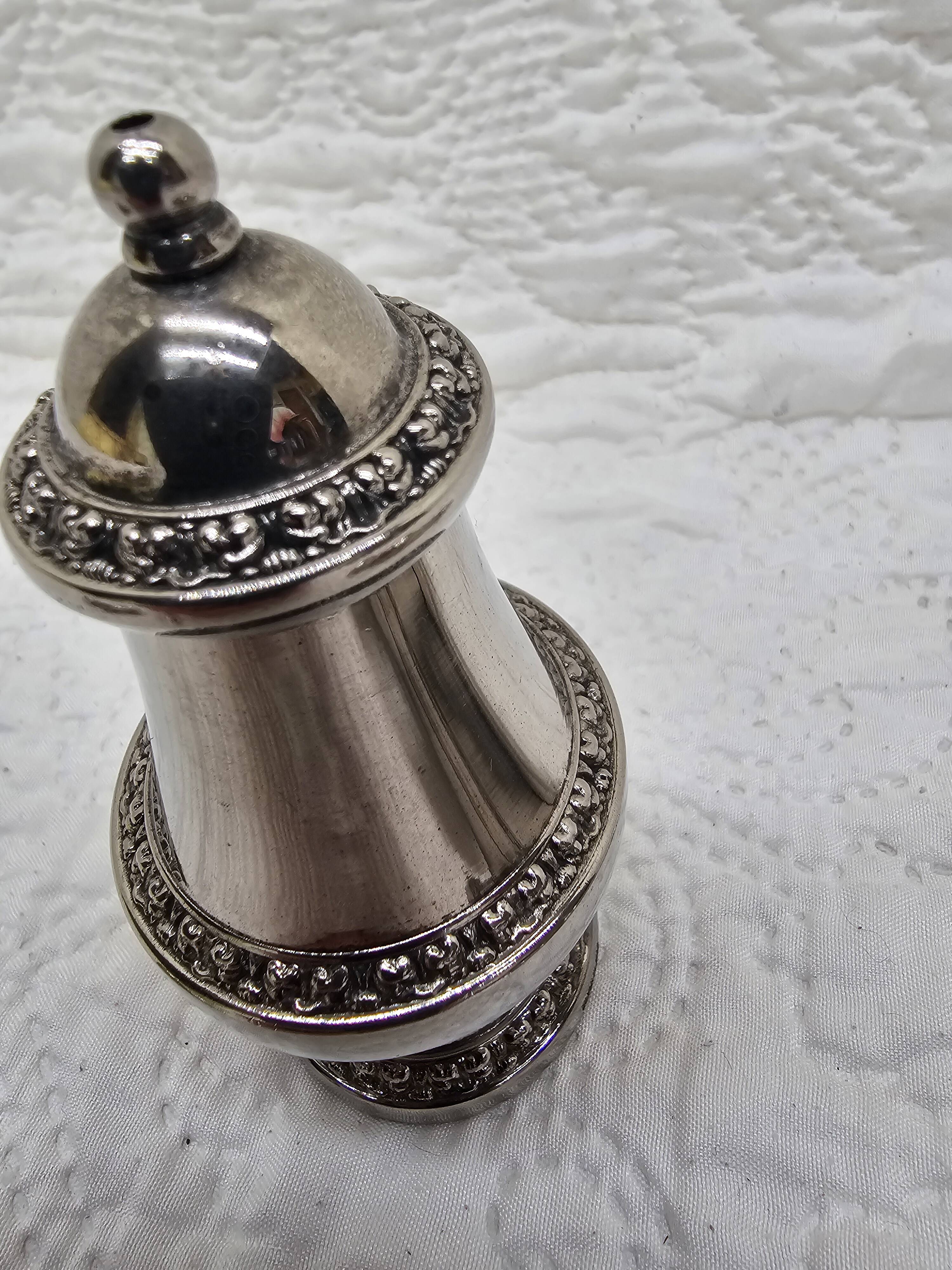 Silver-plated salt and pepper shakers and egg cups