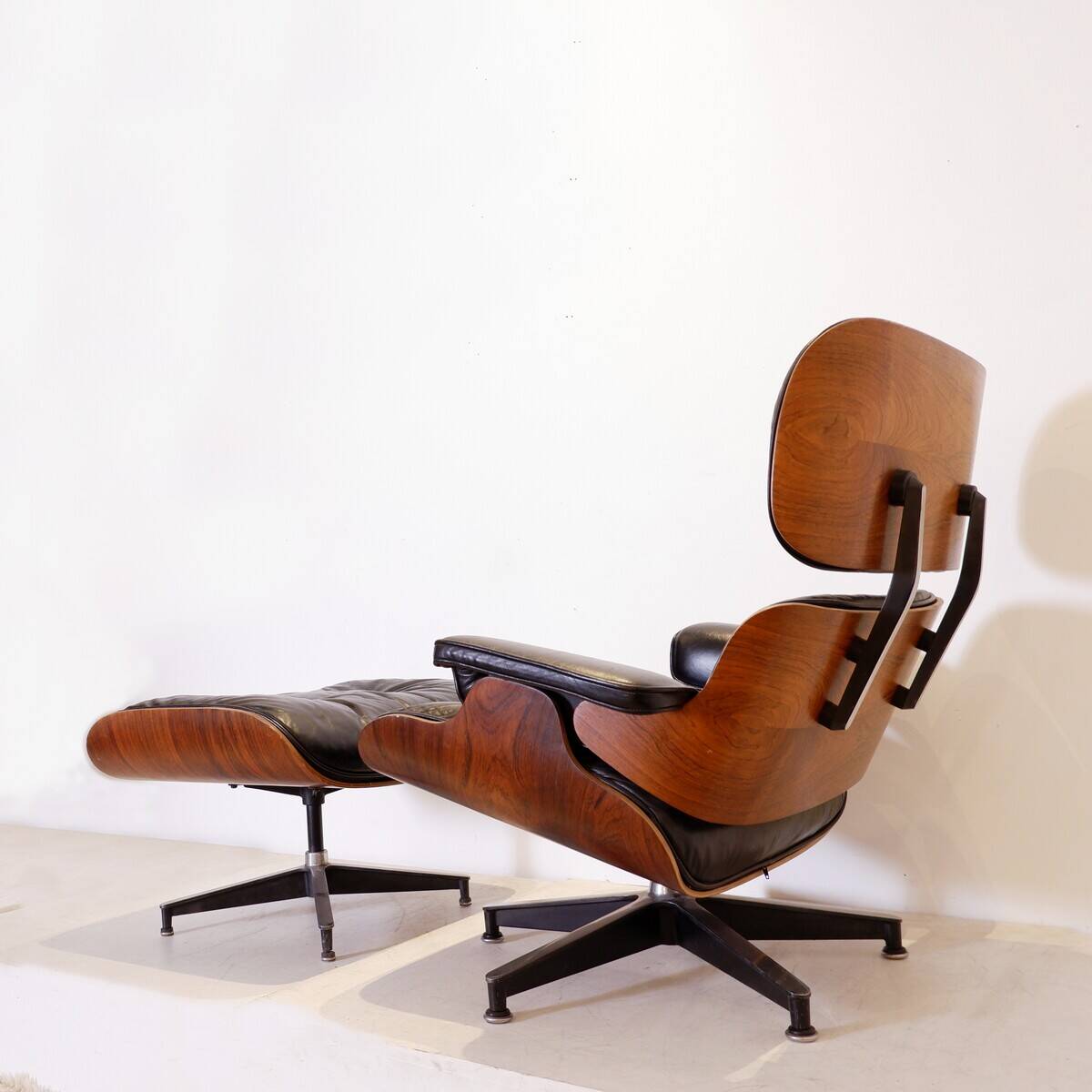 Mid-Century armchair and footrest by Charles & Ray Eames for Herman Miller