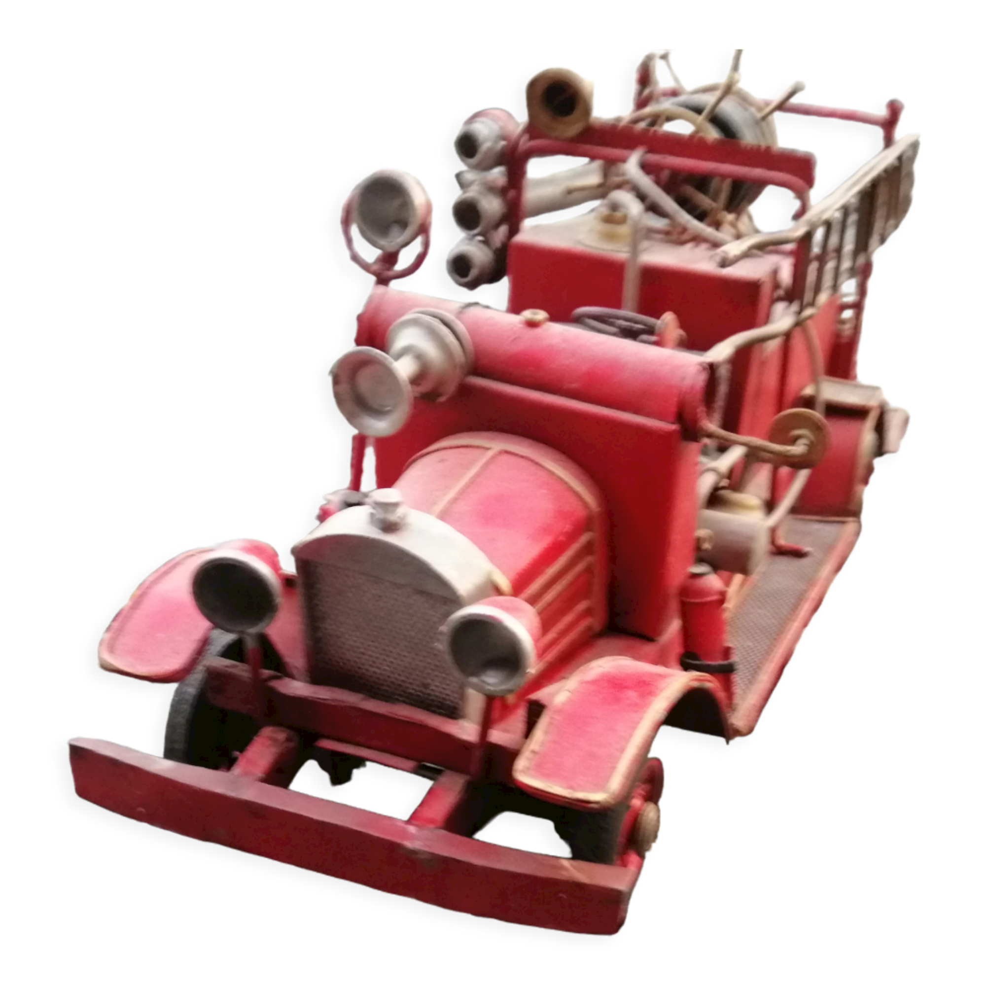 American fire truck from 1930 in sheet steel with all its water lance accessories,