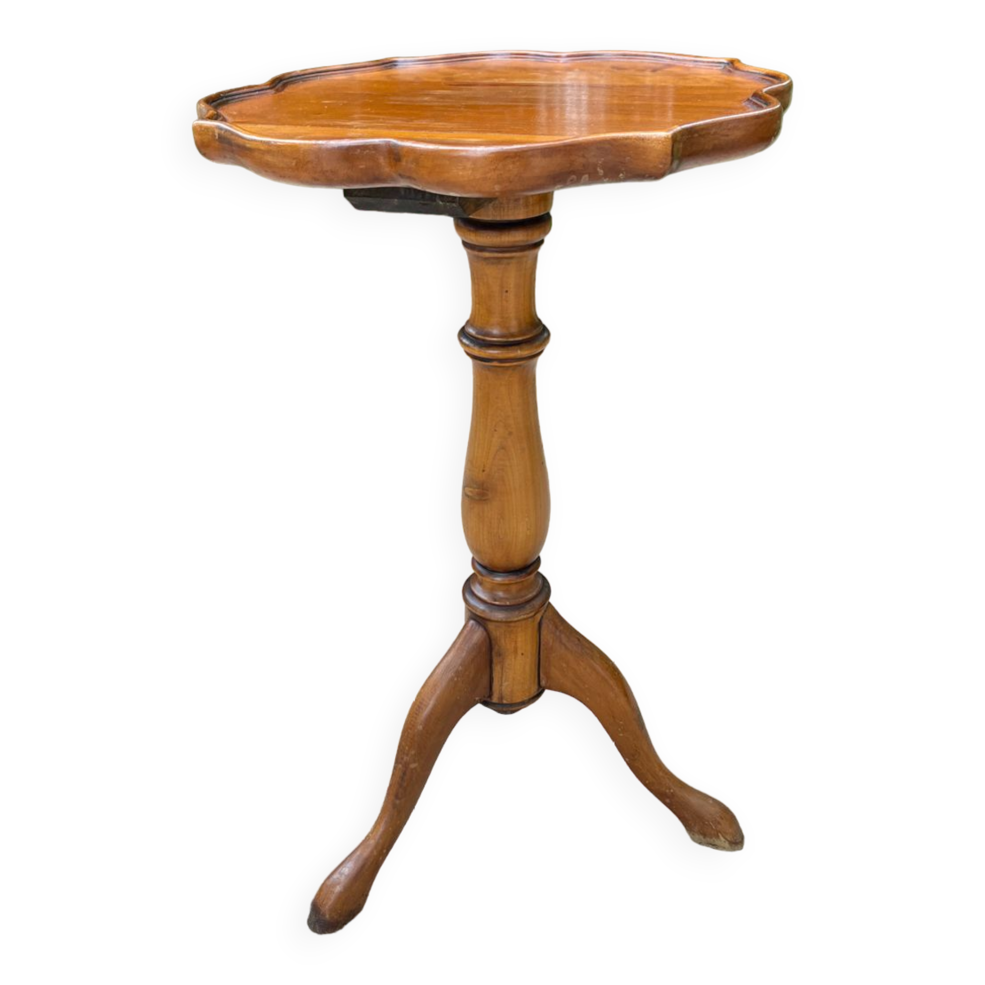 Small wooden pedestal table