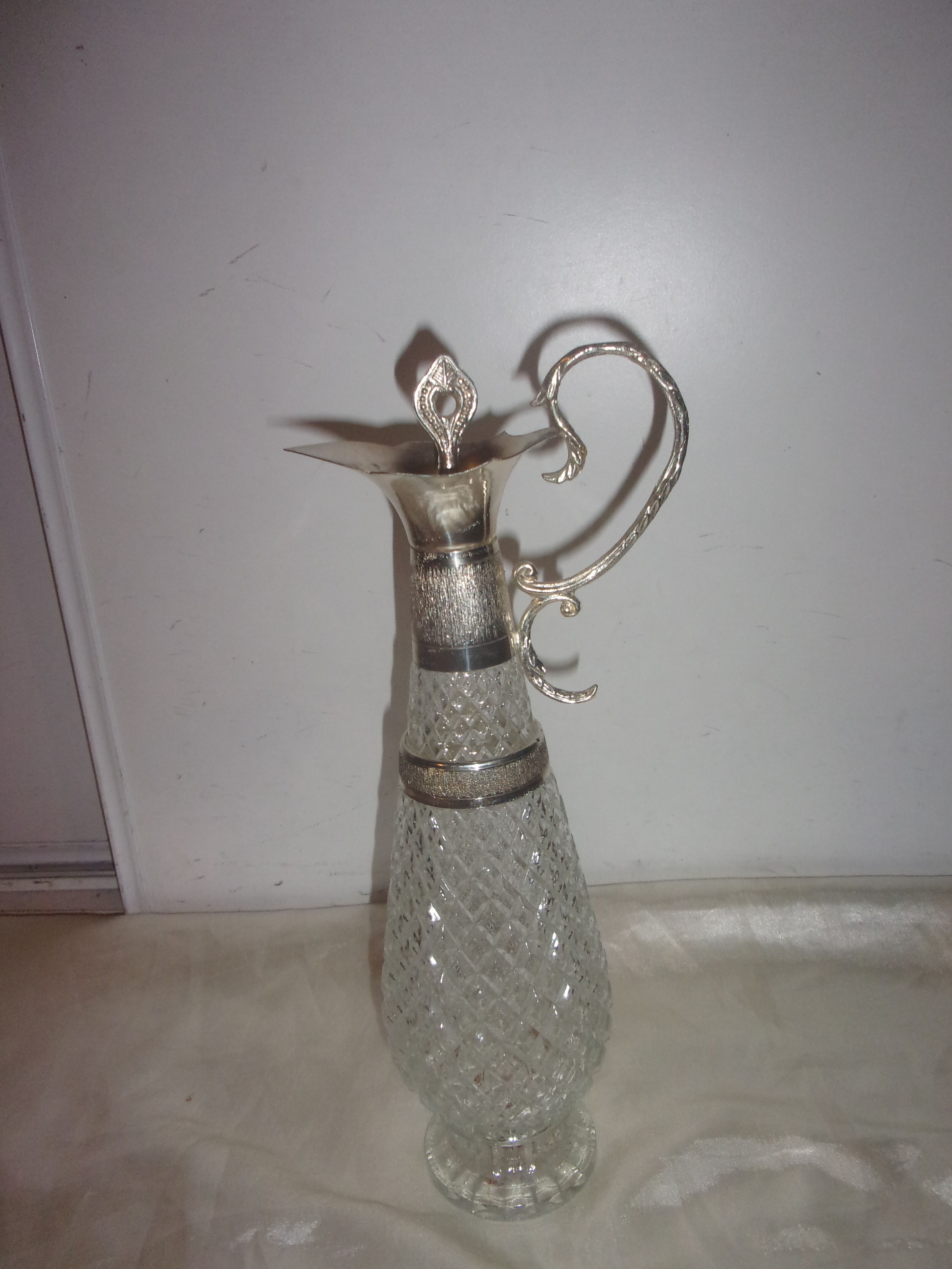 Silver glass and metal ewer