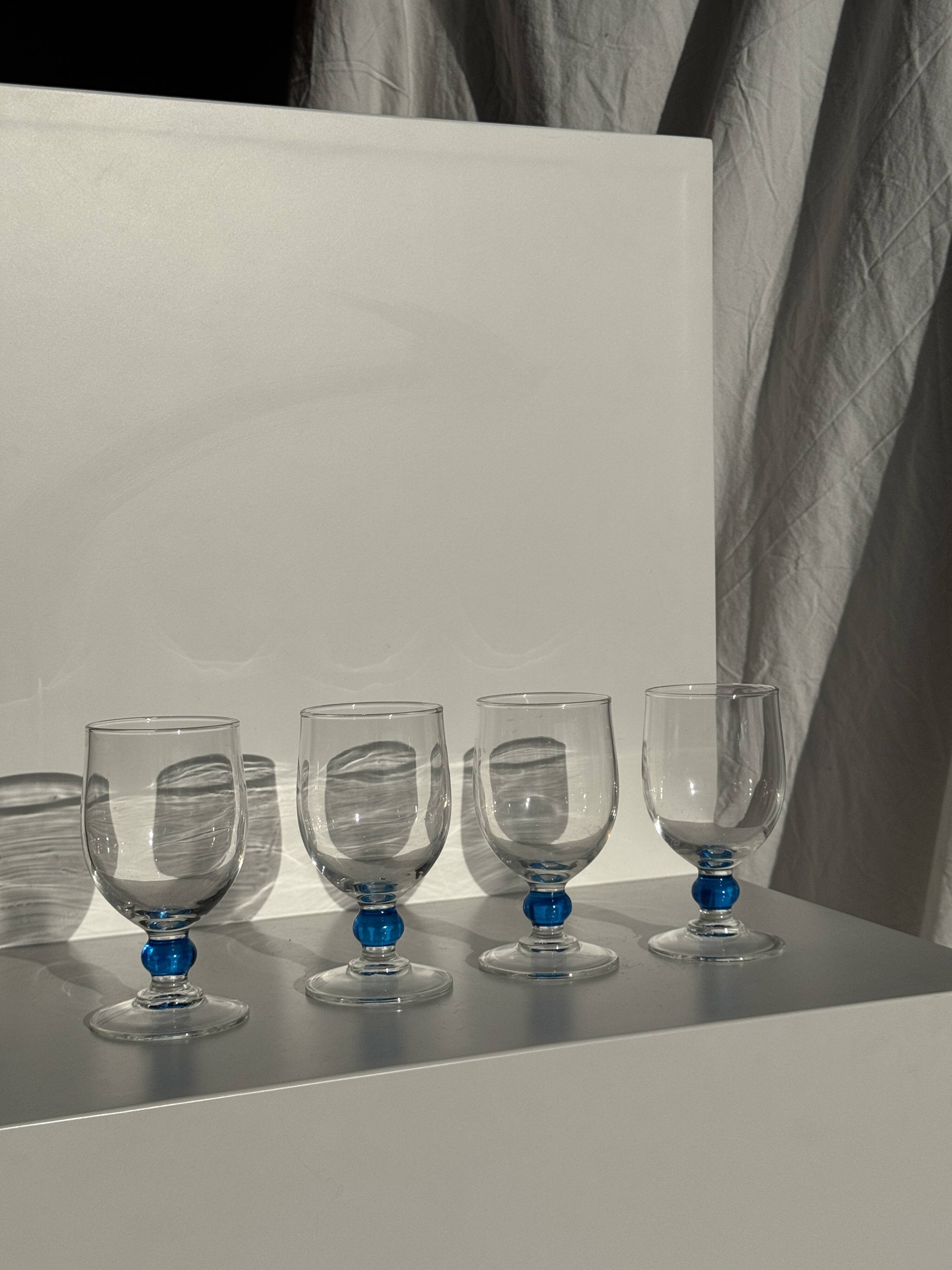 Set of 4 blue ball stemmed water glasses