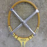 Racket with its vintage cover