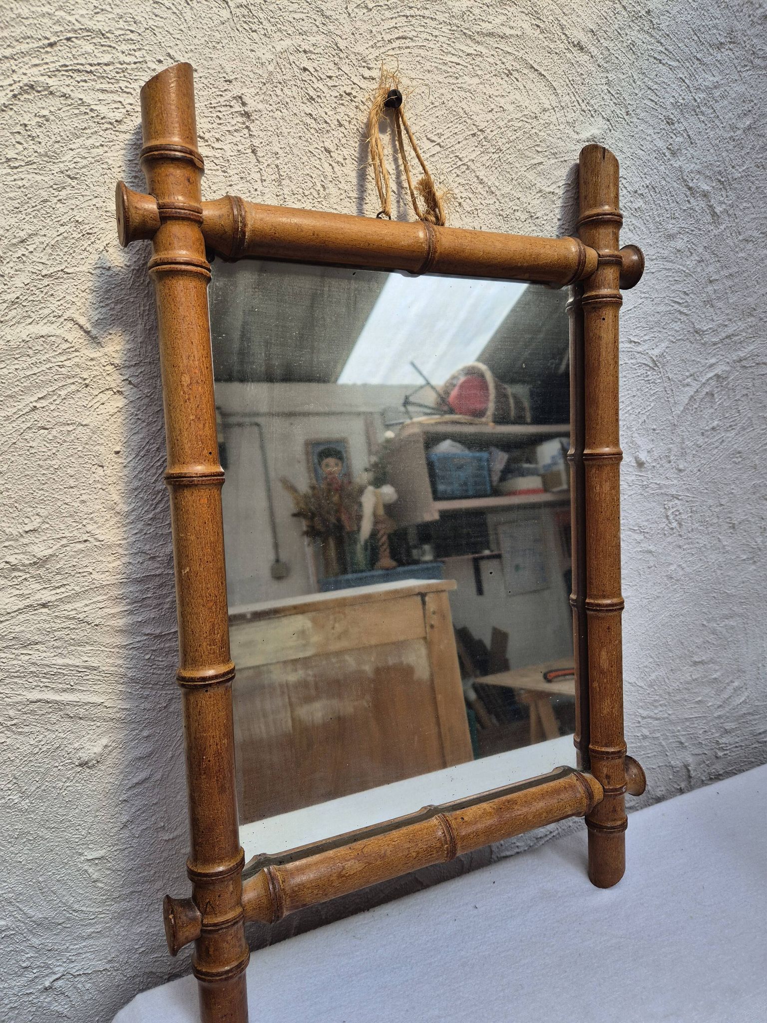 Vintage wooden mirror imitating bamboo