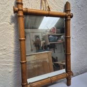 Vintage wooden mirror imitating bamboo