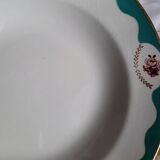 Old hollow plates mismatched in earthenware with gilded edges