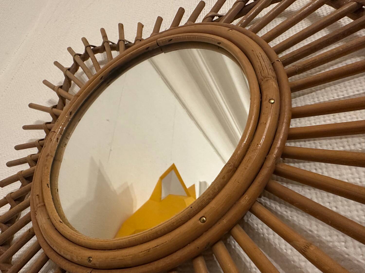 Vintage guitar-shaped rattan mirror