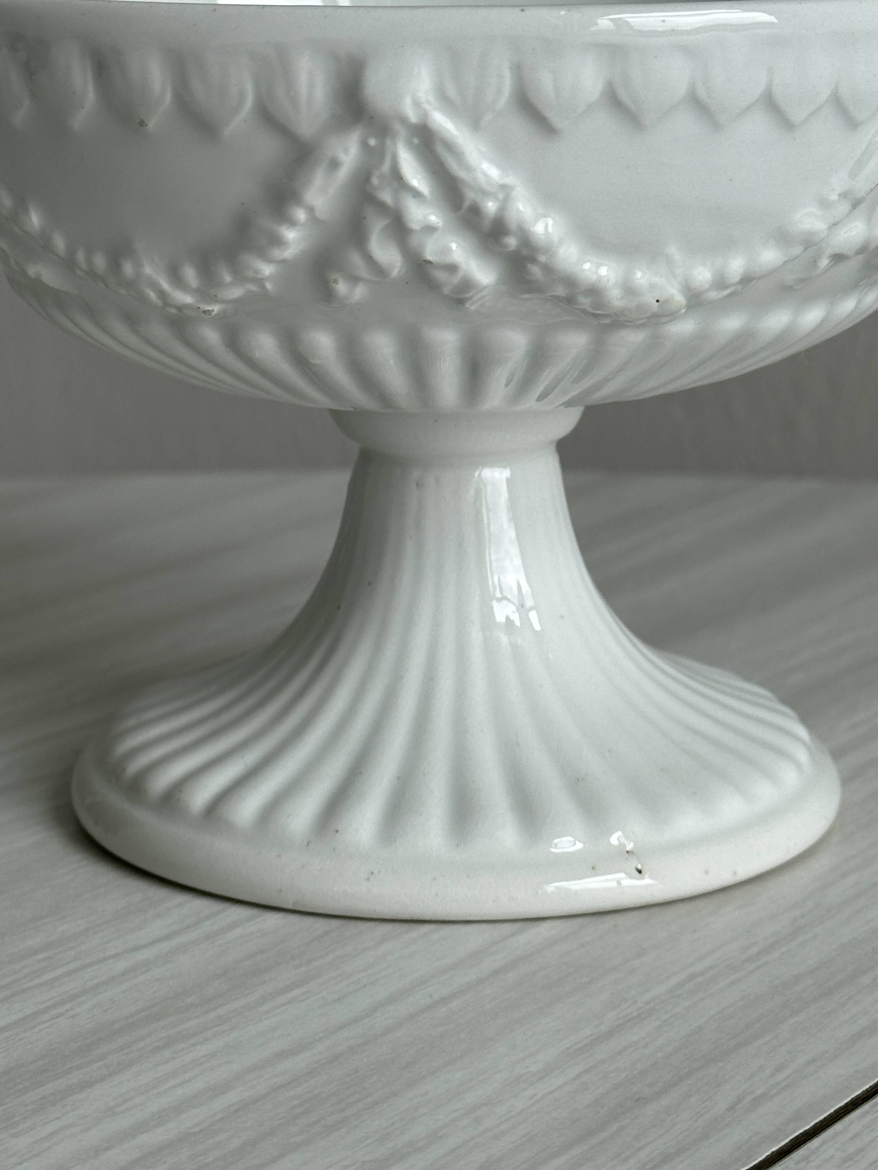Decorated white porcelain cup