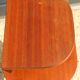 Pair of oak veneered tripod bedside tables 1950