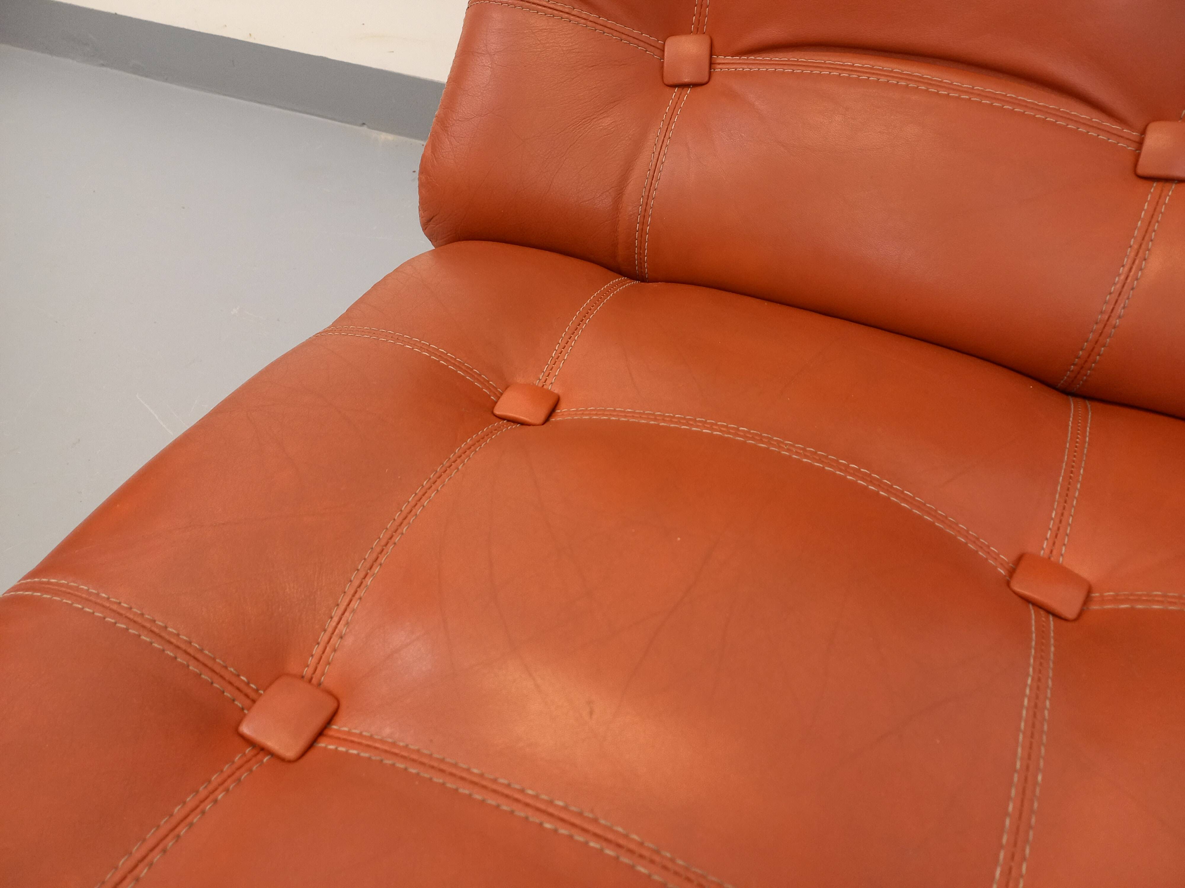 Vintage Roche Bobois armchair in chrome and terracotta leather.