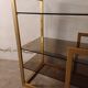 Brass shelf, smoked glass