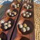 Jeu Awalé africain vintage en bois avec ses 48 graines