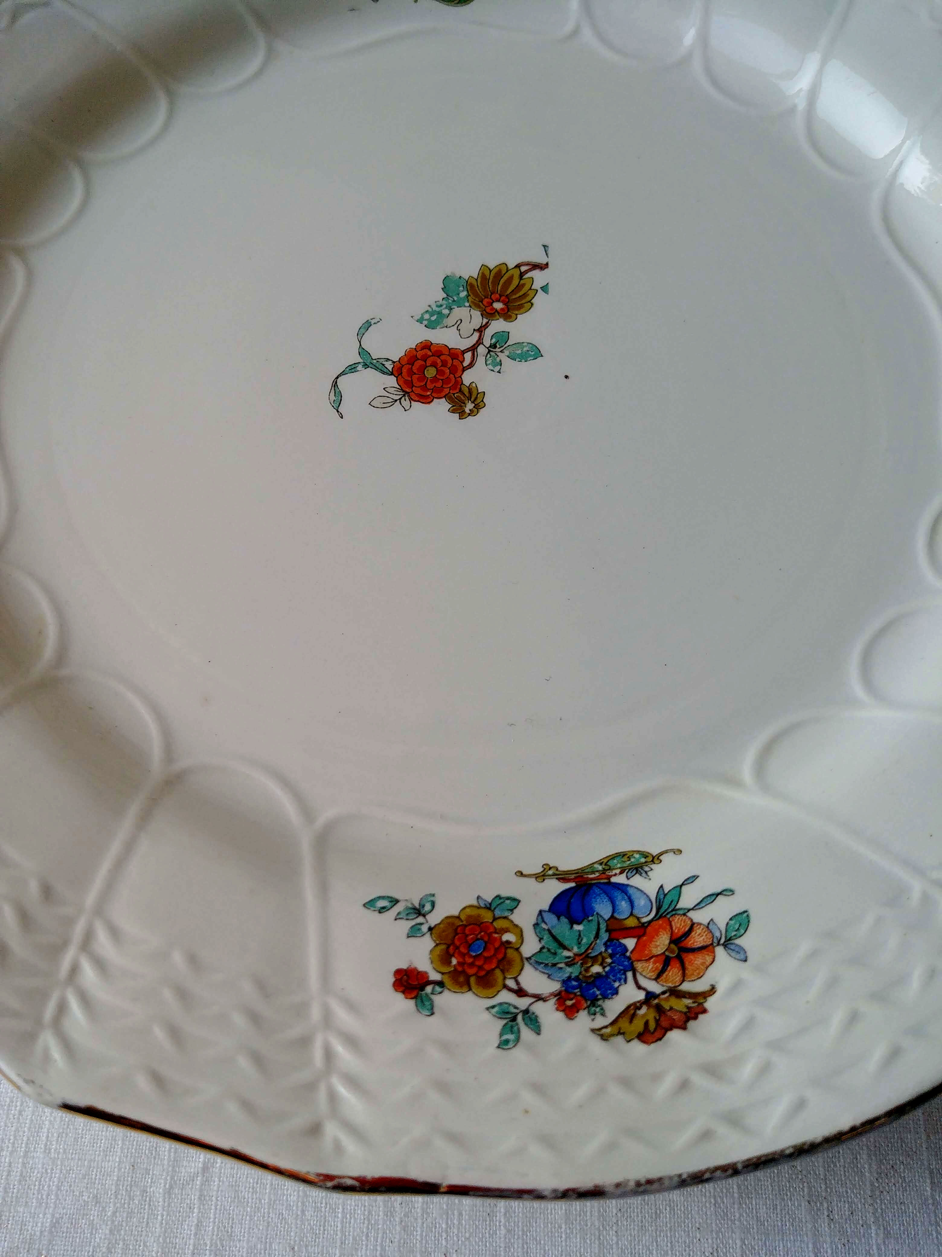 Suite de 4 assiettes Sarreguemines