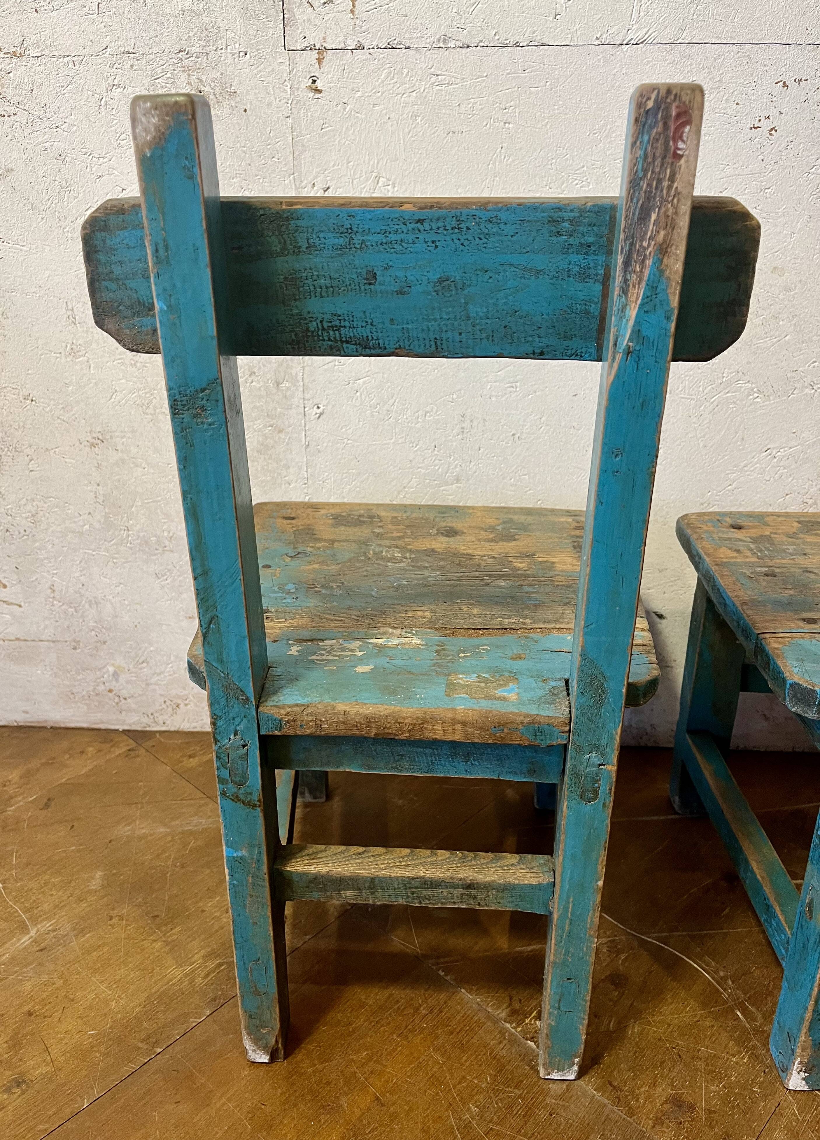 Old pair of small children's school chairs