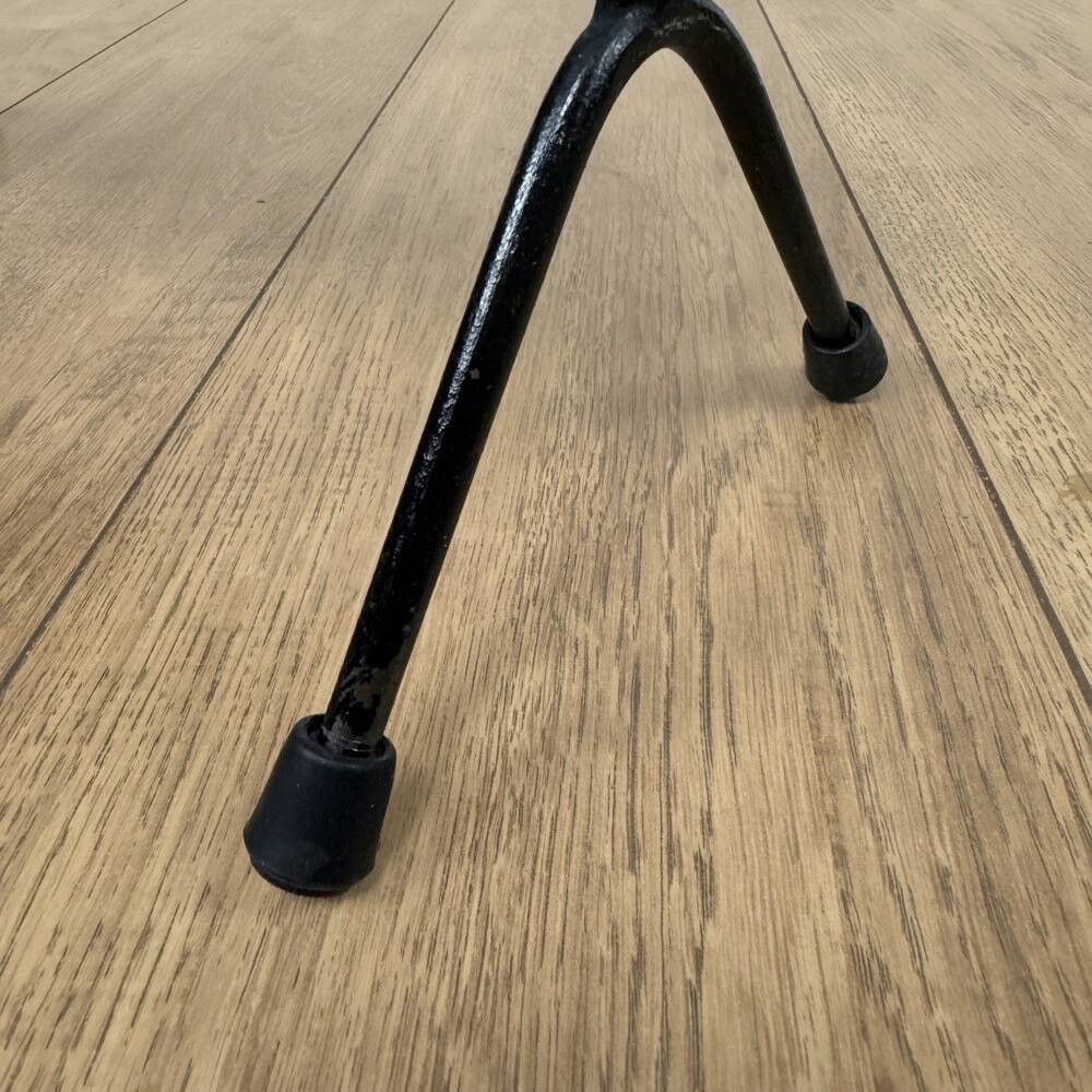 Graphic metal and brass magazine rack