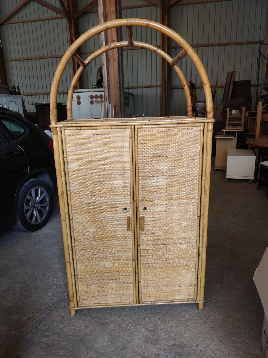 Two-door wicker and bamboo wardrobe