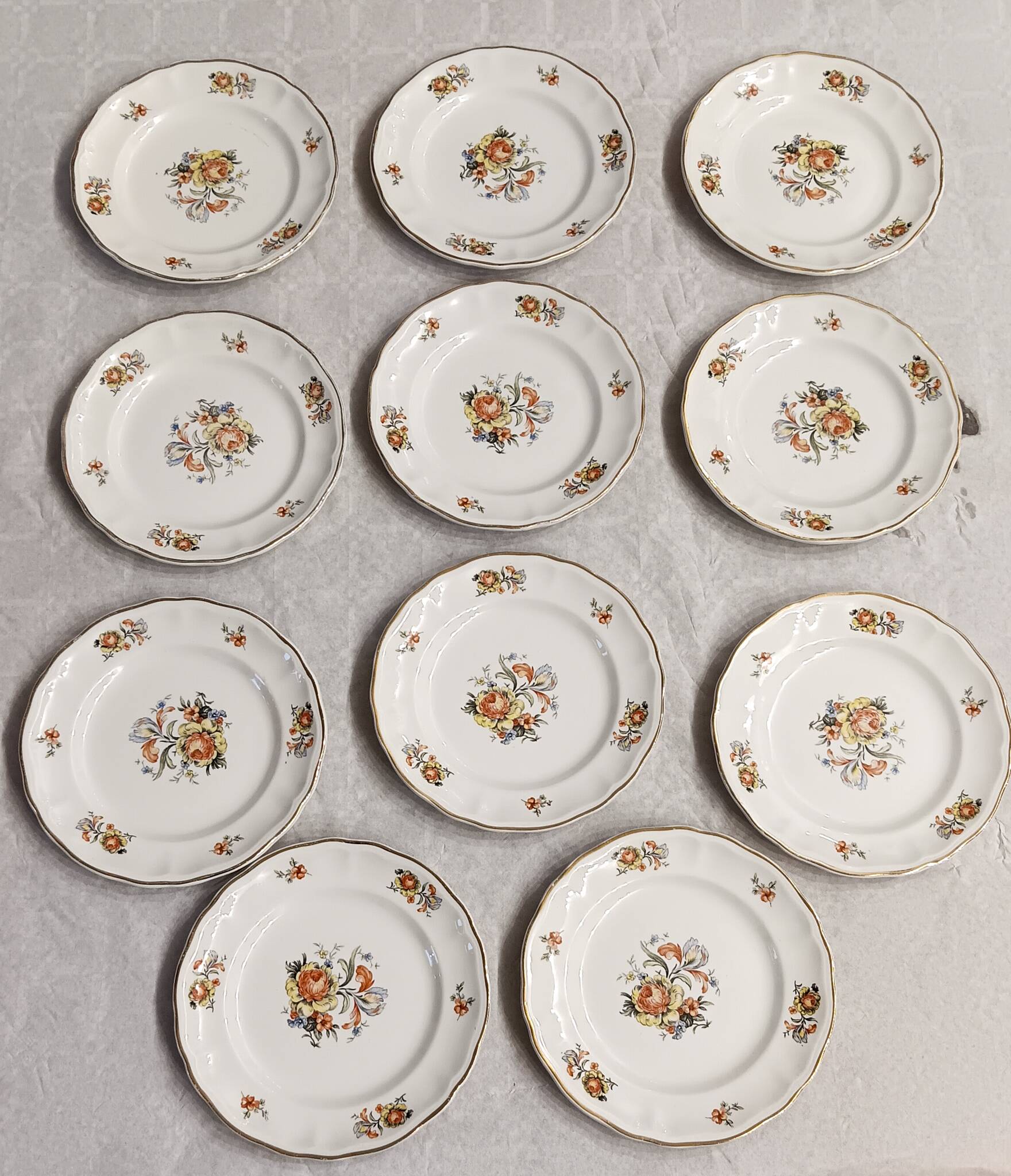 11 starter or dessert plates, KG Lunéville, Marie-Thérèse model - Yellow, blue floral patterns