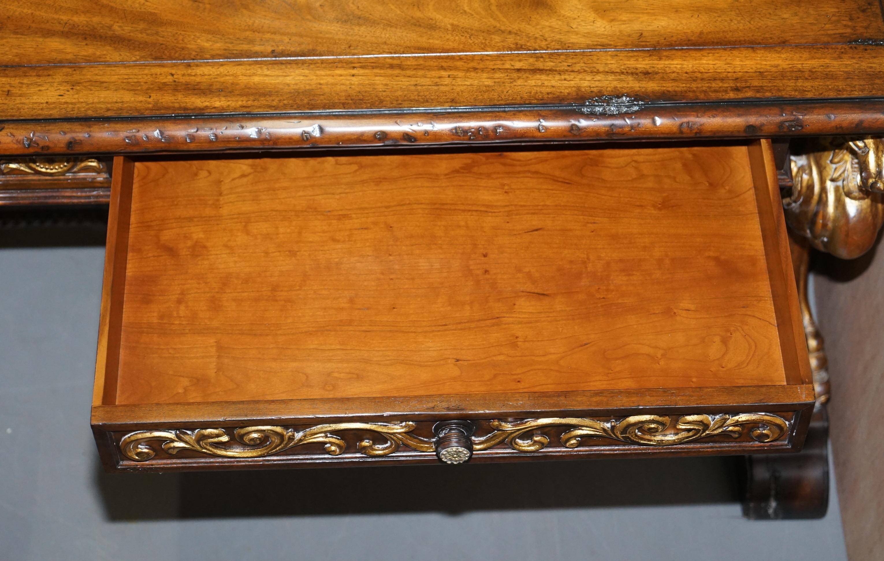 Double-sided writing desk in hardwood with gilt griffins, RJ Horner style.